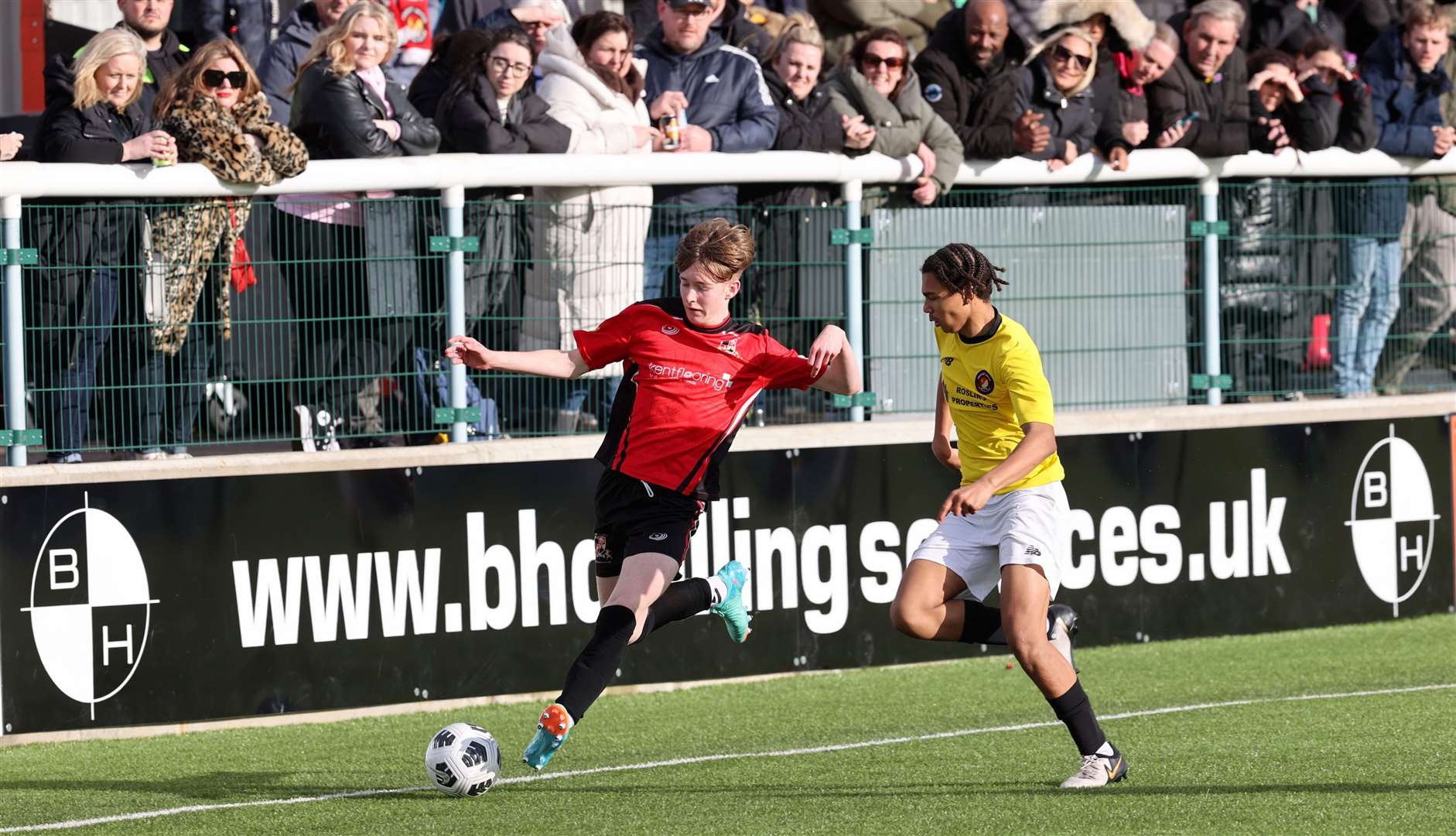 The crowd look on as Rochester under-15s (red) look to advance against Ebbsfleet on Sunday. Picture: PSP Images
