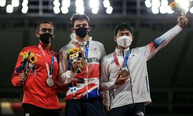 Joe Choong on the podium after winning gold in the modern penatathlon at the Tokyo Olympics. Picture: UPIM Media
