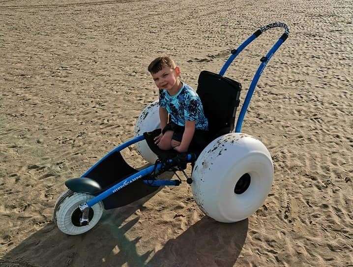 Tony Hudgell on his all-terrain wheelchair at Camber Sands (12339660)