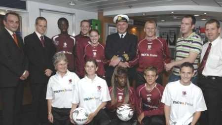 Canterbury City players and officials with P&O staff on board the Pride of Canterbury ferry. Picture: CHRIS DAVEY