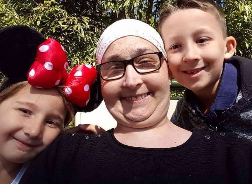 Clare with Lilly-Rae, five, and Connor, 10, at Disneyland
