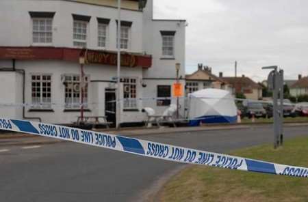 Scene of crime officers look for clues at the pub. Picture: BARRY GOODWIN