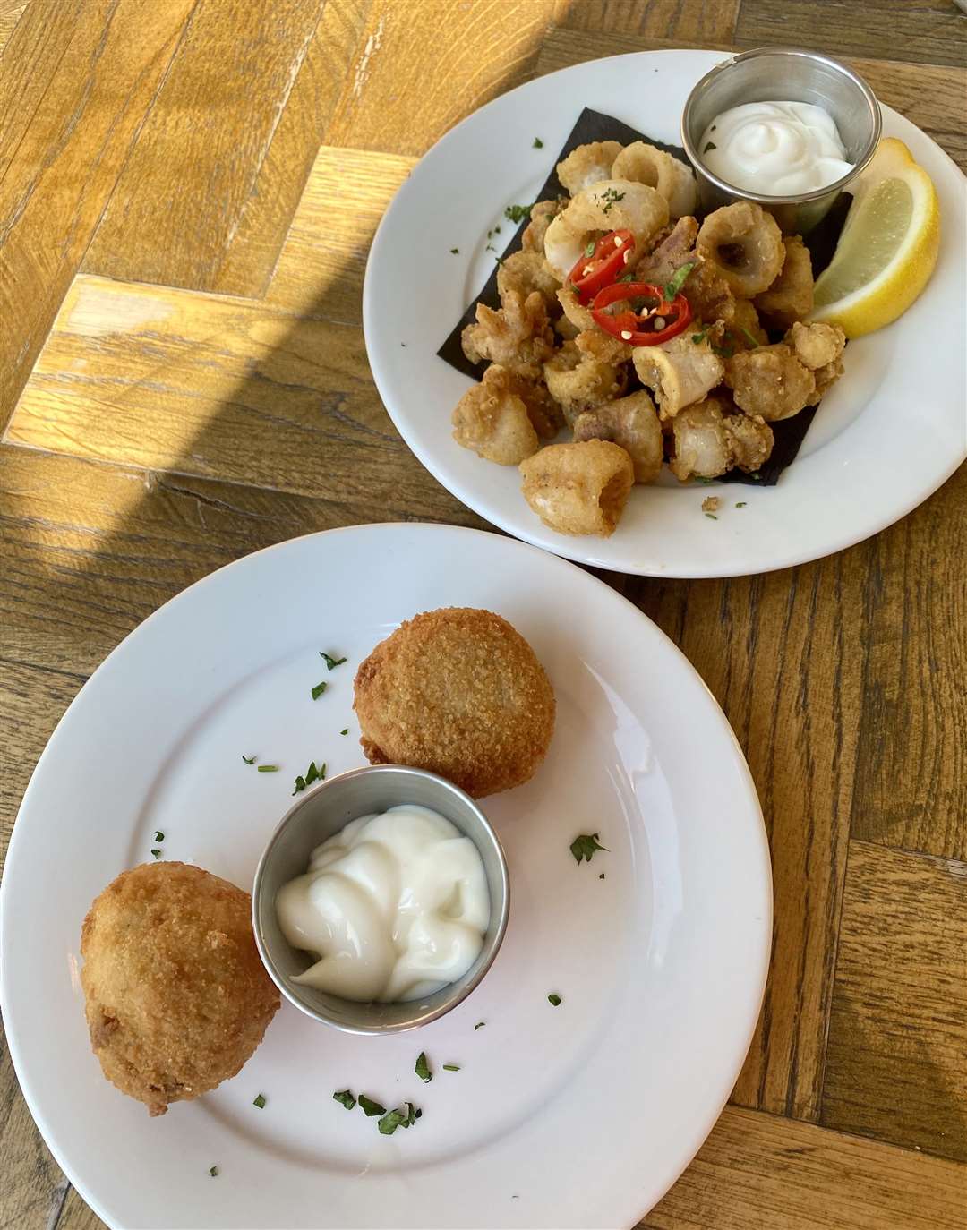 We started with mushroom arancini and crispy squid. Picture: Sam Lawrie