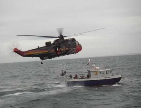 Dover lifeboat working with the Belgian Air Force Sea King helicopter