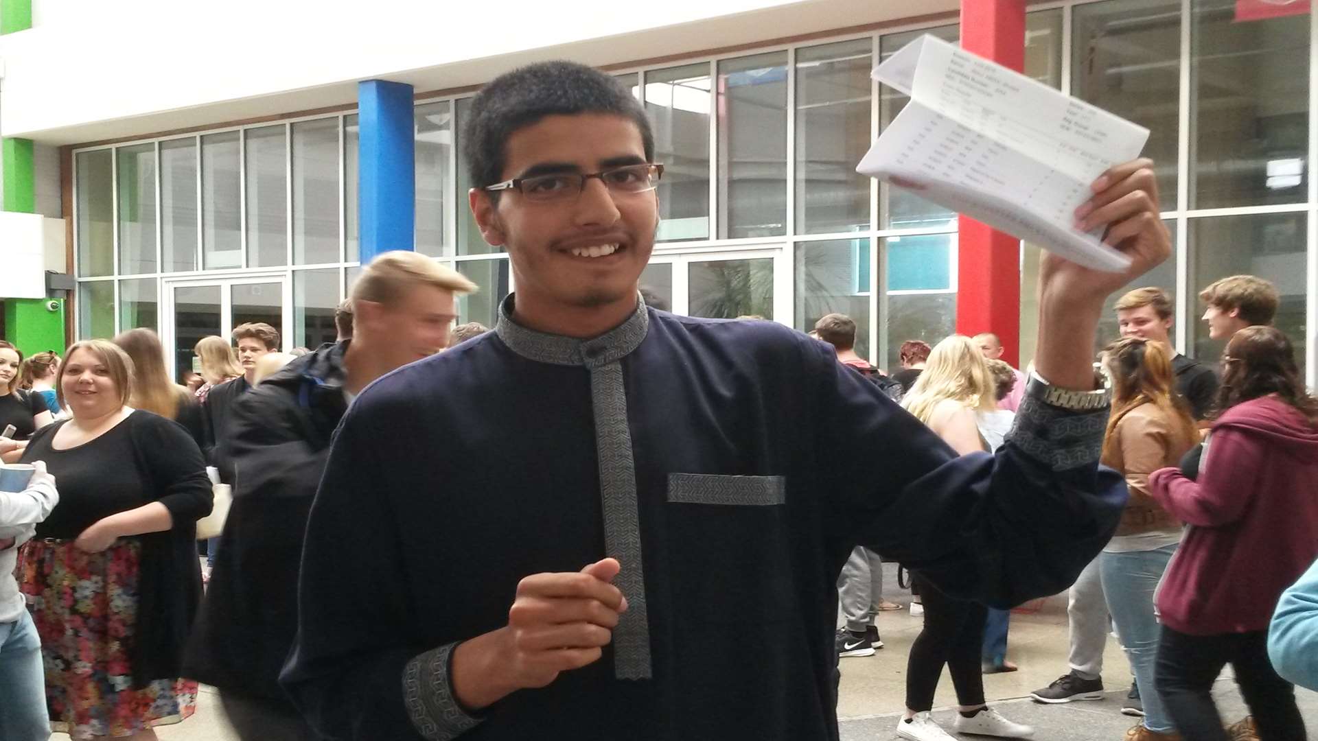 Abdul Mueed with his results at The Charles Dickens School
