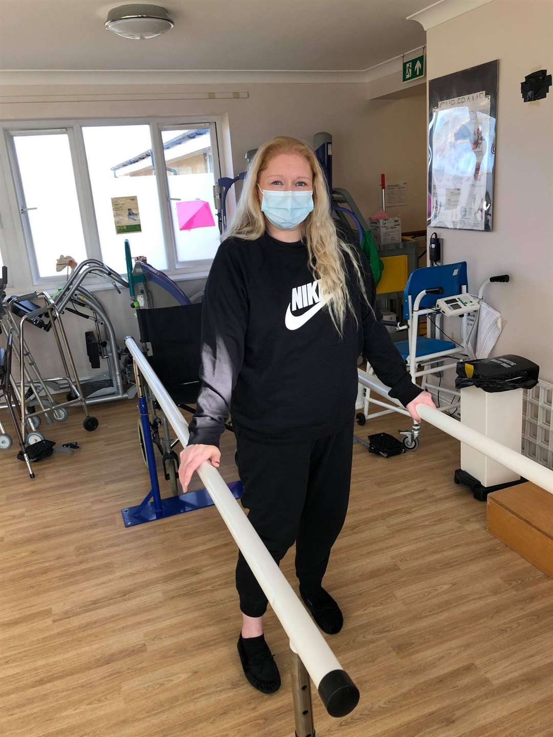 Kelly Cooney, 37, is having physiotherapy to help her walk again after suffering from paralysis as a result of Covid-19