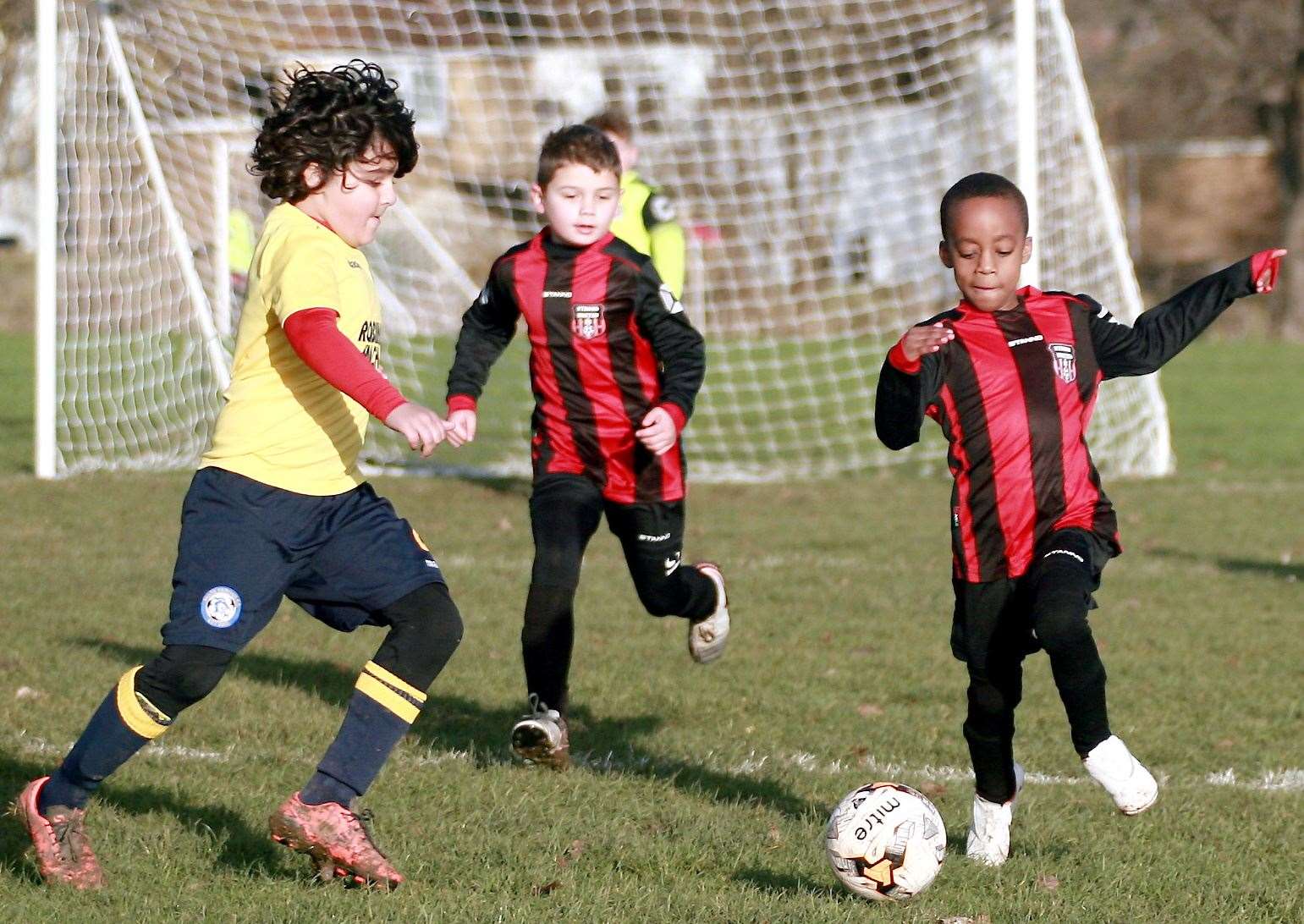Iwade Herons United under-8s (left) take on Strood United under-8s Picture: Phil Lee
