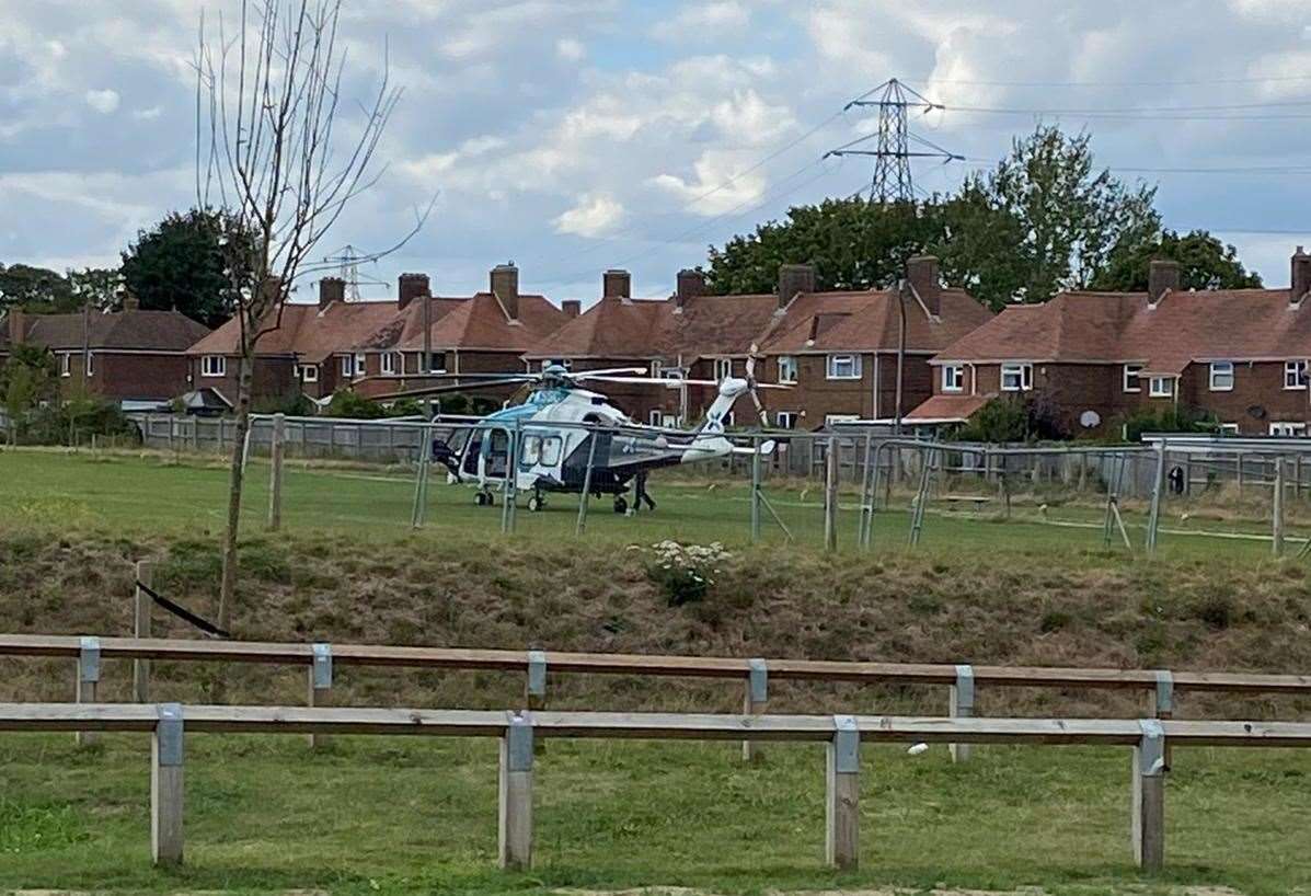 The air ambulance landed on the field off Church Road