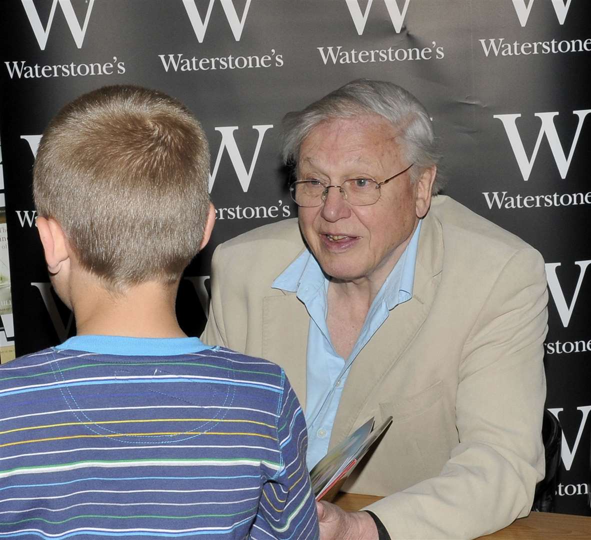 Sir David Attenborough meeting a young fan in June 2009