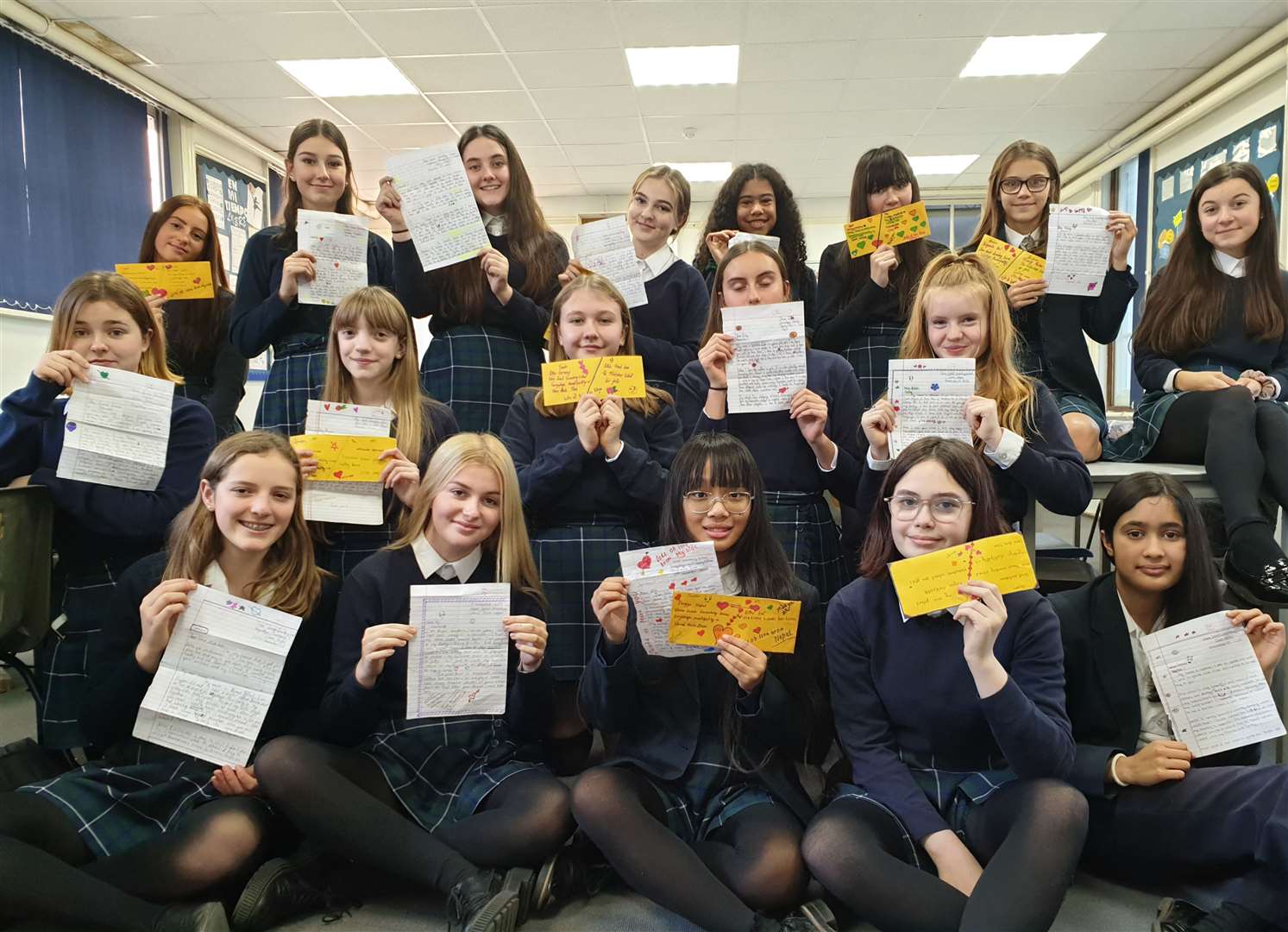 Pupils at Folkestone School for Girls with letters from their global pen pals. Picture: Folkestone School for Girls