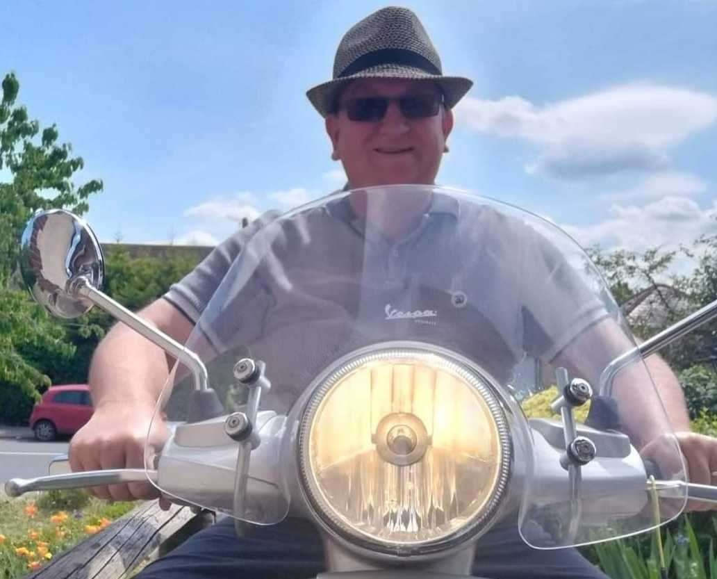 Mr Weaver on his Vespa scooter. Picture: Stuart Weaver