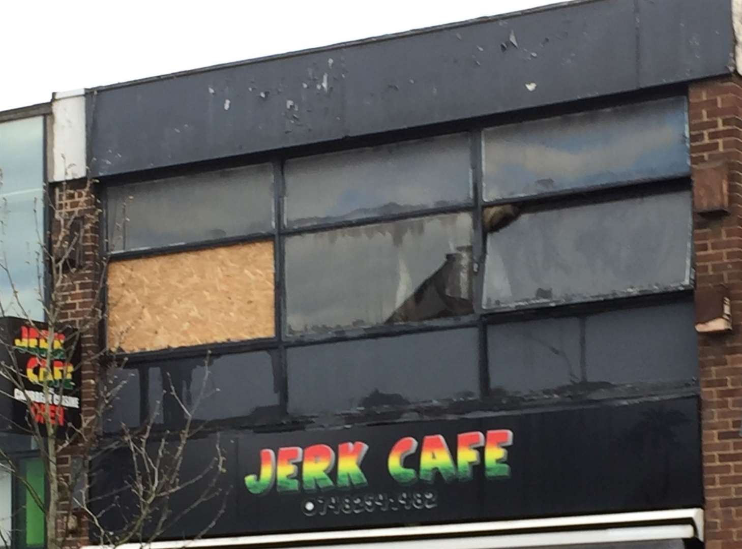 Firefighters said damage was caused to an upstairs storage room as owners of Jerk Cafe say the business will be closed until further notice