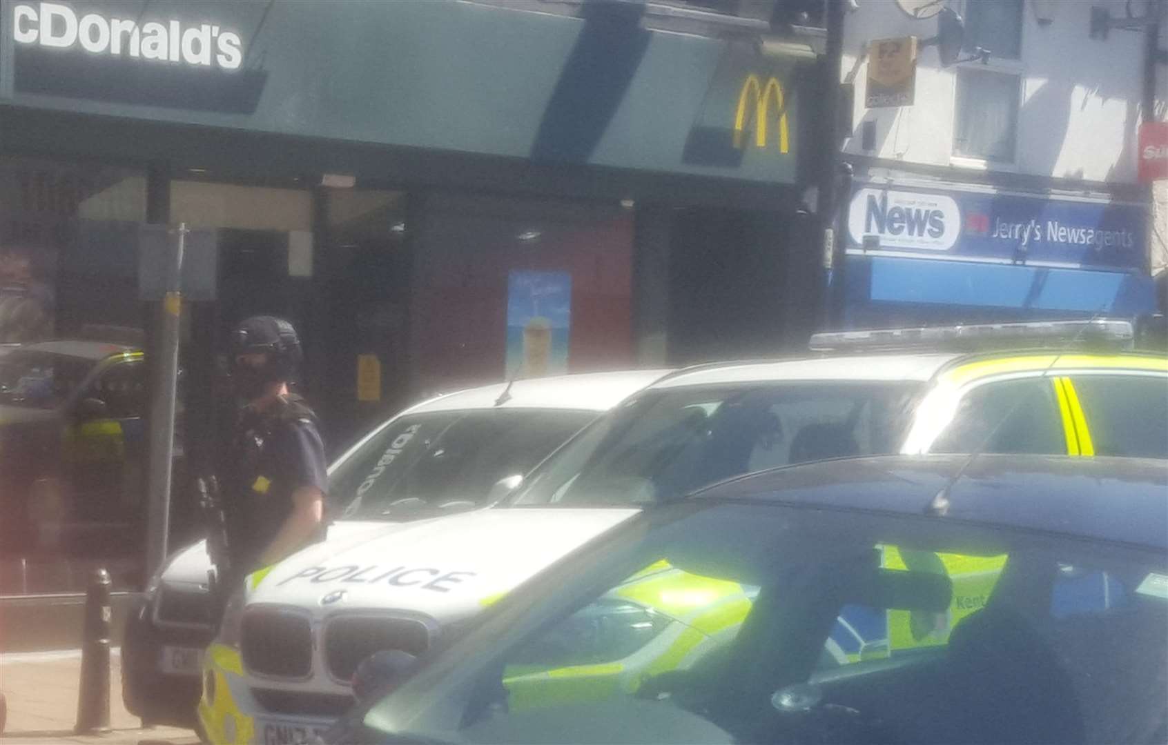 Armed police at the scene. Picture: James Randall