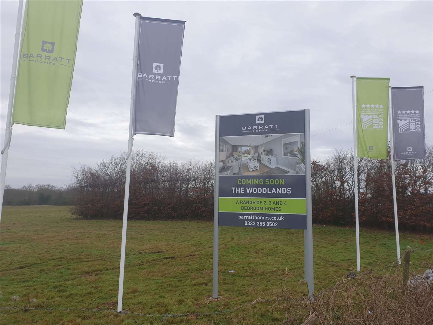 Barratt Homes has erected "coming soon" signs around the site