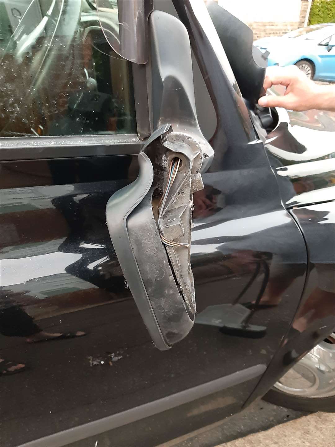 Mr Hoskins' damaged car mirror. Picture: Angela Hoskins