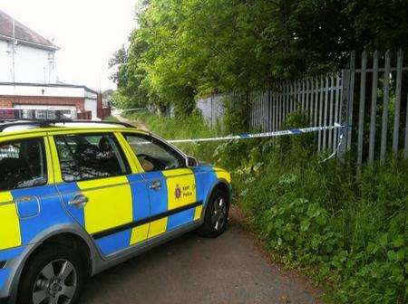 Police cordon off an alley off Rochester Road, Gravesend