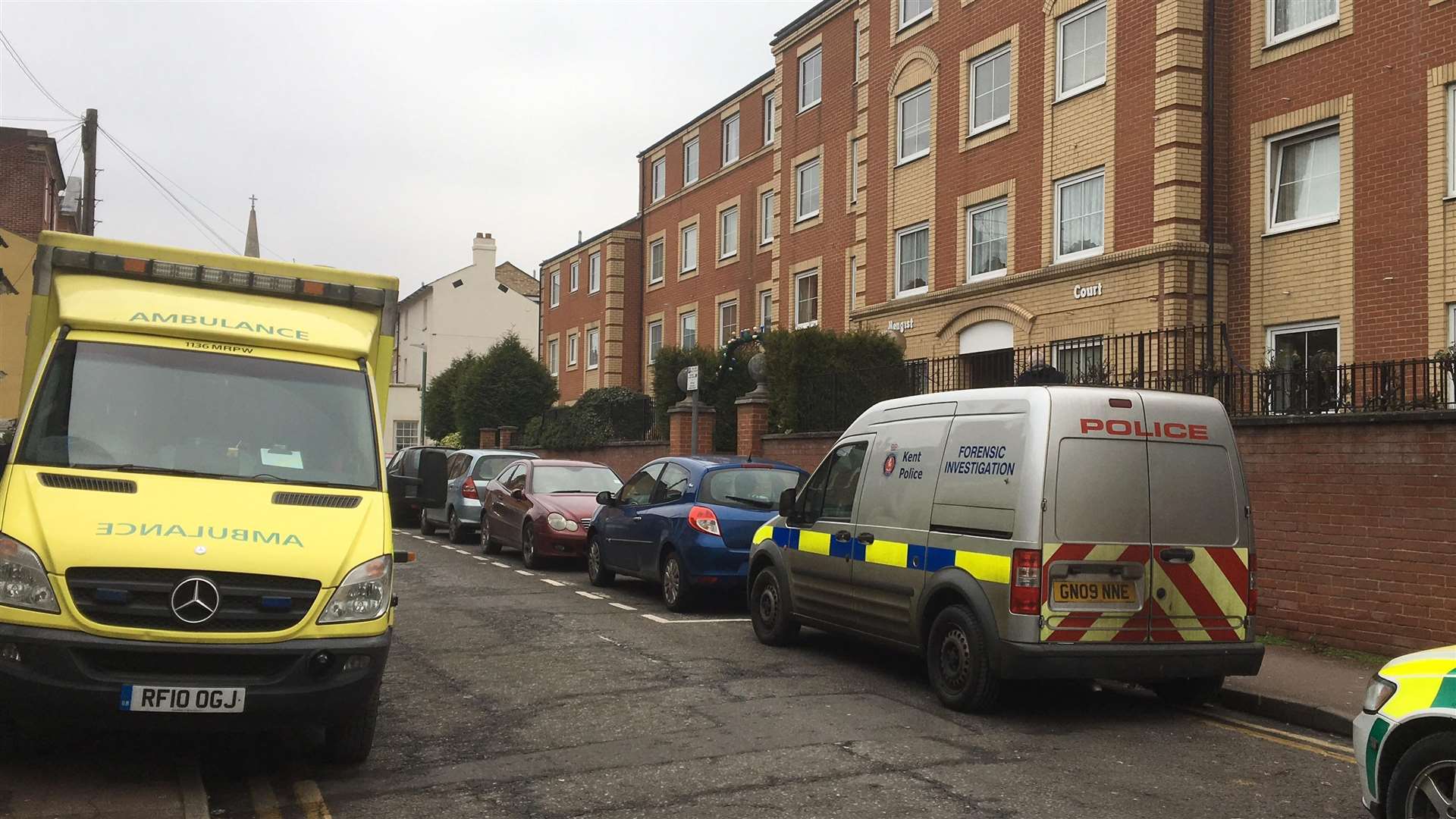 Emergency services in Marsham Street, Maidstone after a woman was seriously injured in an attack at Hengist Court in 2017
