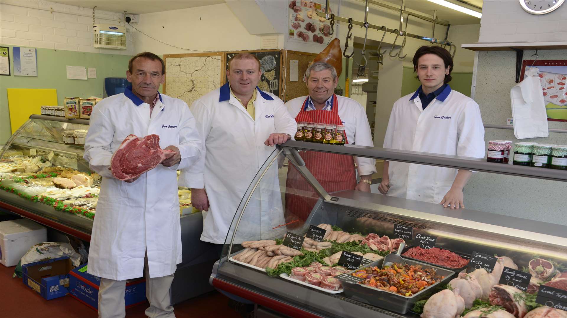 David "Dazy" Saunders, second left, at Farm Butchers St Michael's with, left to right, owner John Howe, Mick Clayson and Toby Howe.