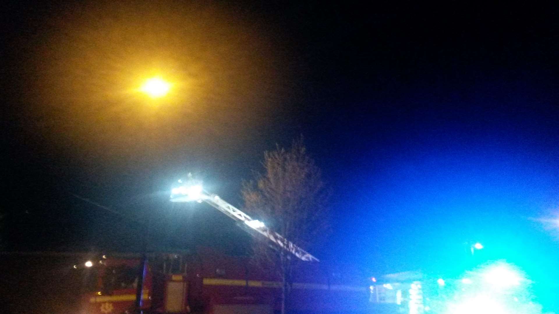 Firefighters used a height ladder to tackle the fire at the Tesco Express in Mace Lane, Ashford