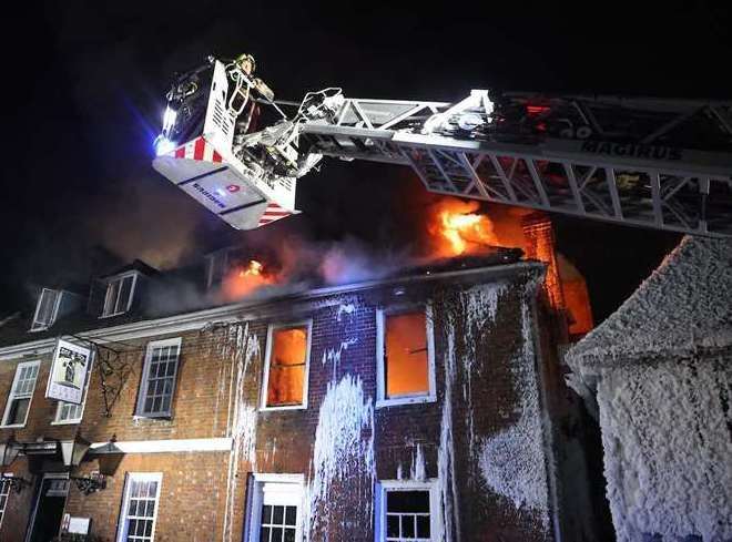 Crews stayed overnight to tackle the blaze. Picture: UKNIP