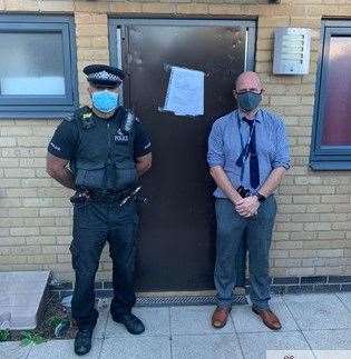 PC Shokar with a Dartford council housing officer after the house was shut down following a court order. Photo: Kent Police