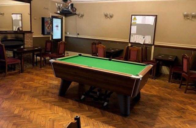 There’s plenty of room to play your shots around this pool table, and you can’t help but admire the parquet flooring