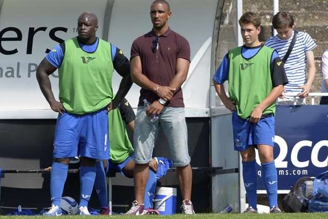 Adebayo Akinfenwa watches from the sidelines during the first-half of Gills' friendly against Bromley on Saturday. Picture: Andy Payton