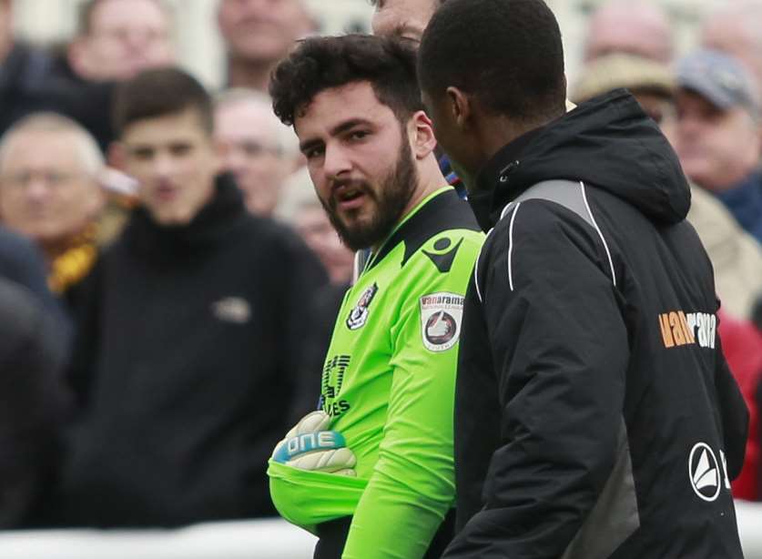 Injured Dartford goalkeeper Deren Ibrahim makes his way off at Maidstone Picture: Martin Apps