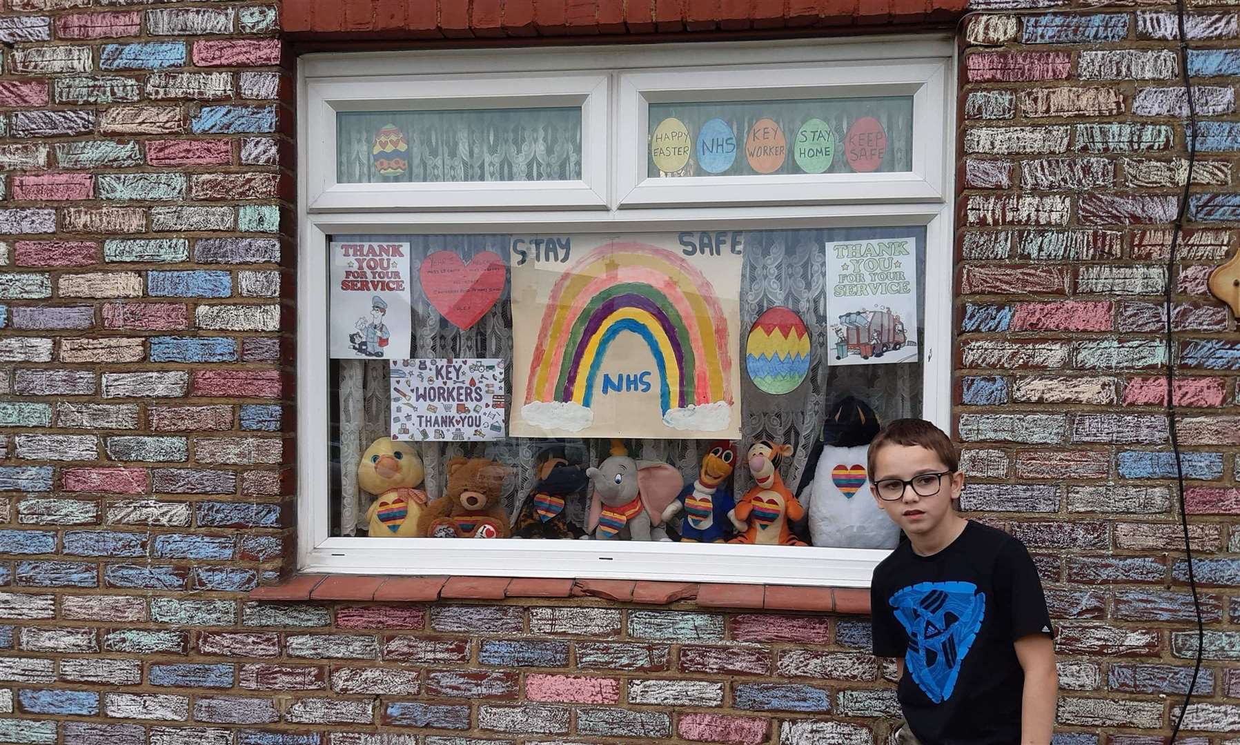Many people have been putting rainbows in their windows to cheer up others during the lockdown, such as Rex Glover, 10, from Sittingbourne