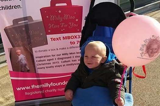 Milly's brother Dougie, one, helping to raising awareness of Milly Moo Here for You