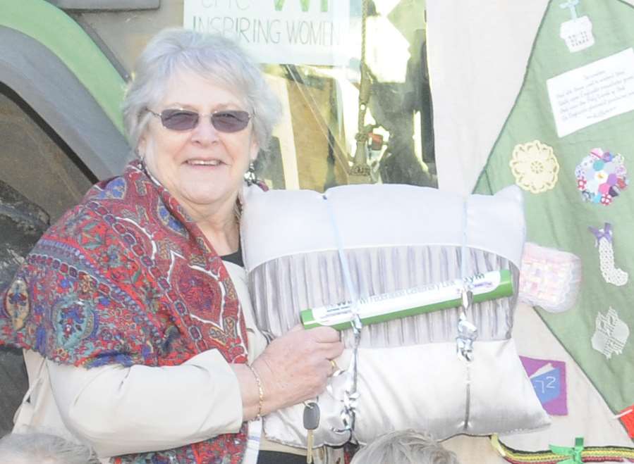 Beryl Ravensdale, vice chairman of East Kent federation WI, with the baton