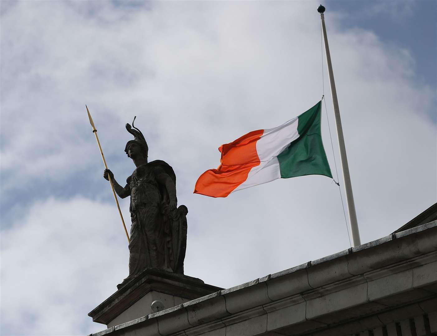 The Irish tricolour flies at half mast to mark the anniversary of the 1916 Easter Rising (Brian Lawless/PA)