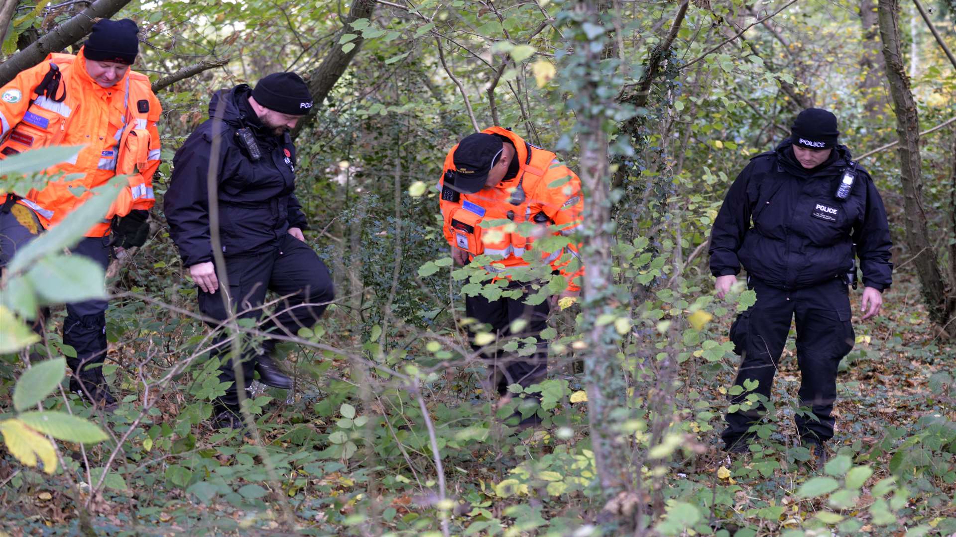 Police searching woodland for the missing dementia sufferer