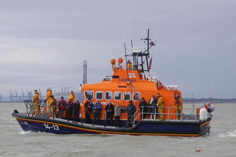 Friends of David Holden aboard the Sheerness RNLI lifeboat as his ashes were scattered