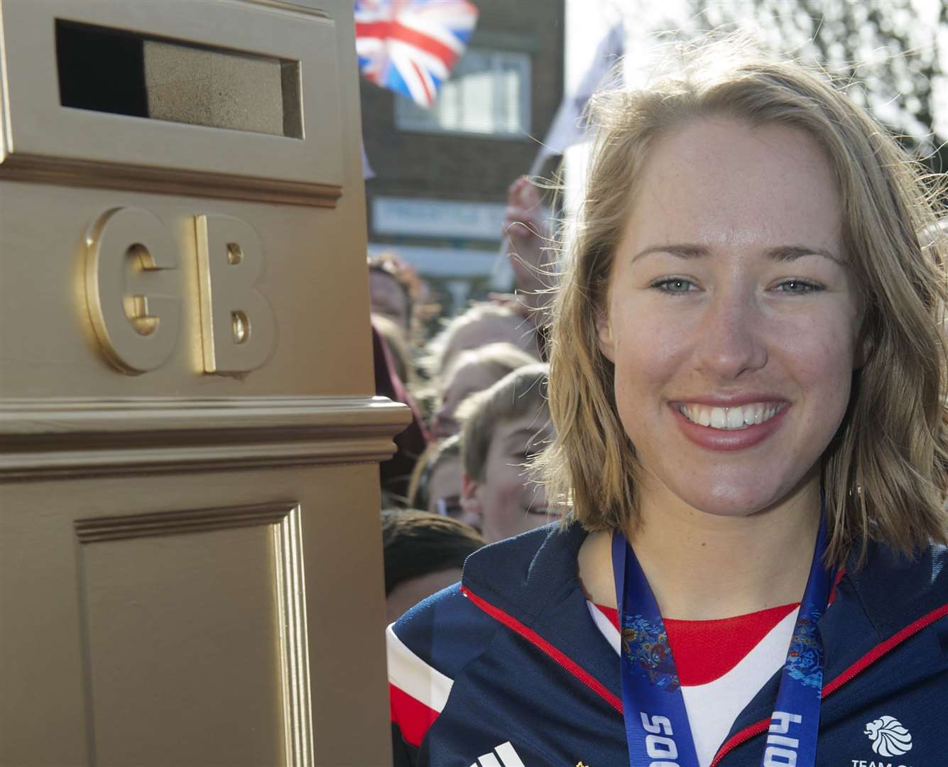 Lizzy Yarnold with her mocked-up golden pillar box after her Winter Olympics glory. Picture: Andy Payton