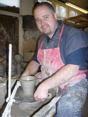 Billy Byles at his potter's wheel