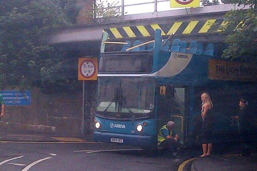 The bus had its roof ripped off after going under the railway bridge in Milton Road, Sittingbourne. Picture: @trgmax