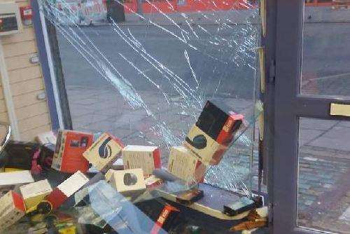 Damage at KR Phones pictured the following day