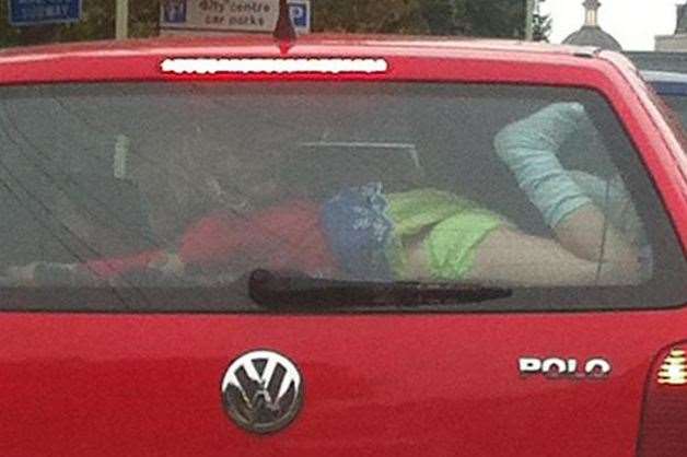 A driver was condemned for allowing a child to lay on the parcel shelf in Canterbury
