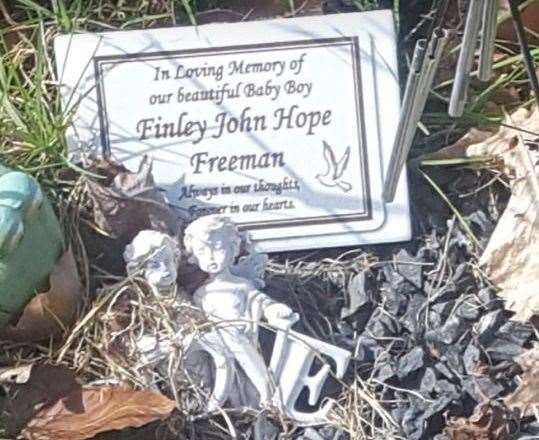 Items on Finley John Hope Freeman's grave have been removed and tampered with (21996824)