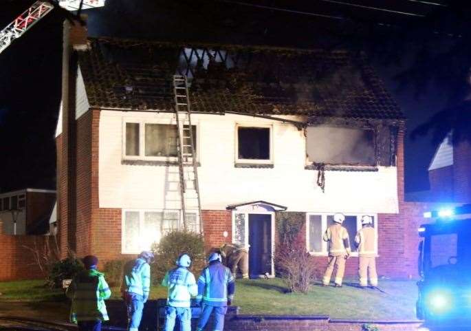 Firefighters dealing with the blaze at the house in Mereworth. Picture: UKNIP