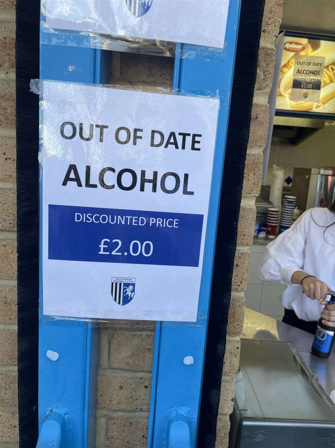 A sign advertising "out of date alcohol" at Priestfield Stadium. Picture by Anthony Potts
