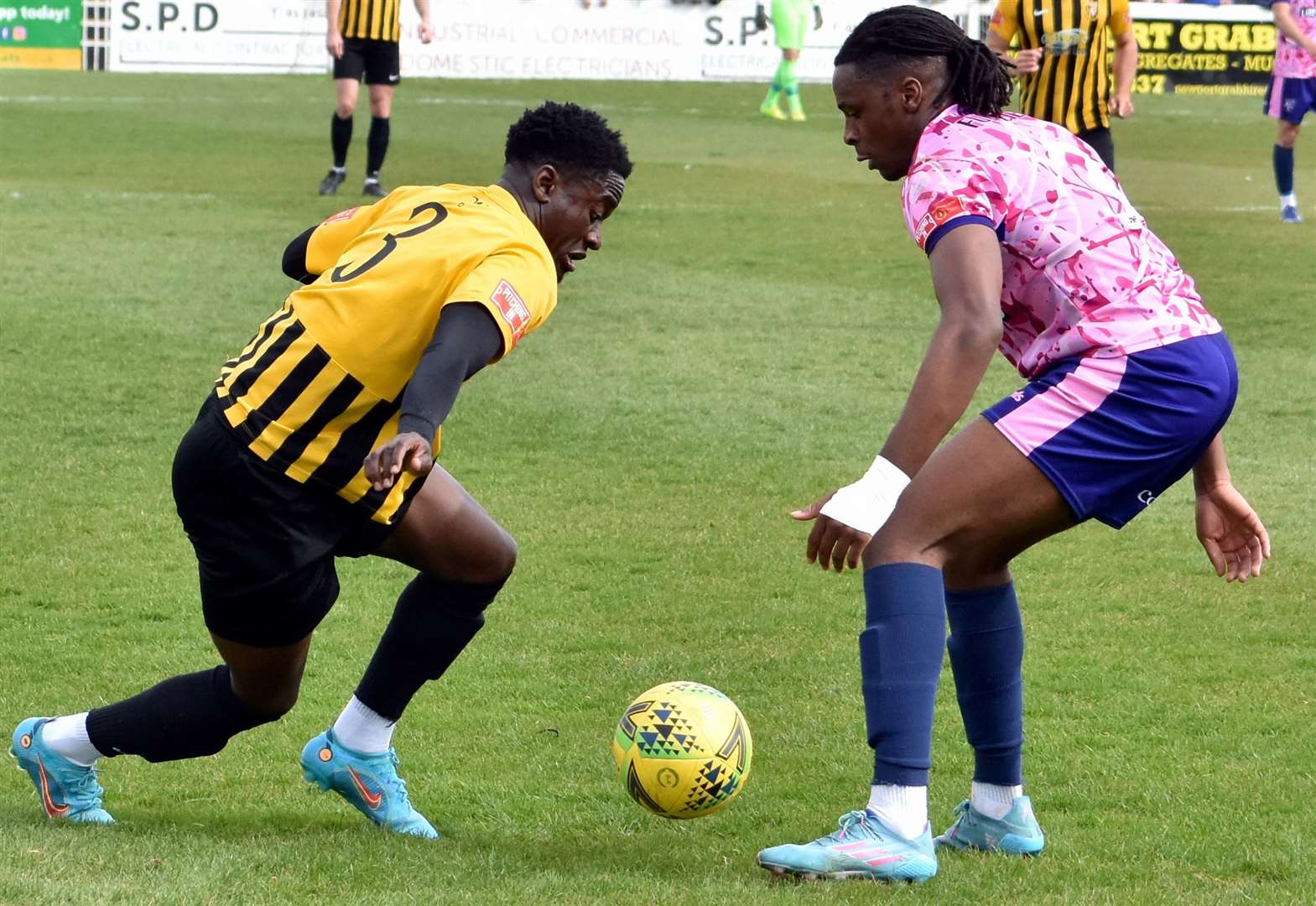 Crossley Lema, playing against Folkestone for Margate, right, had agreed to play at Cheriton Road in 2023/24 – but now has signed for Welling. Picture: Randolph File