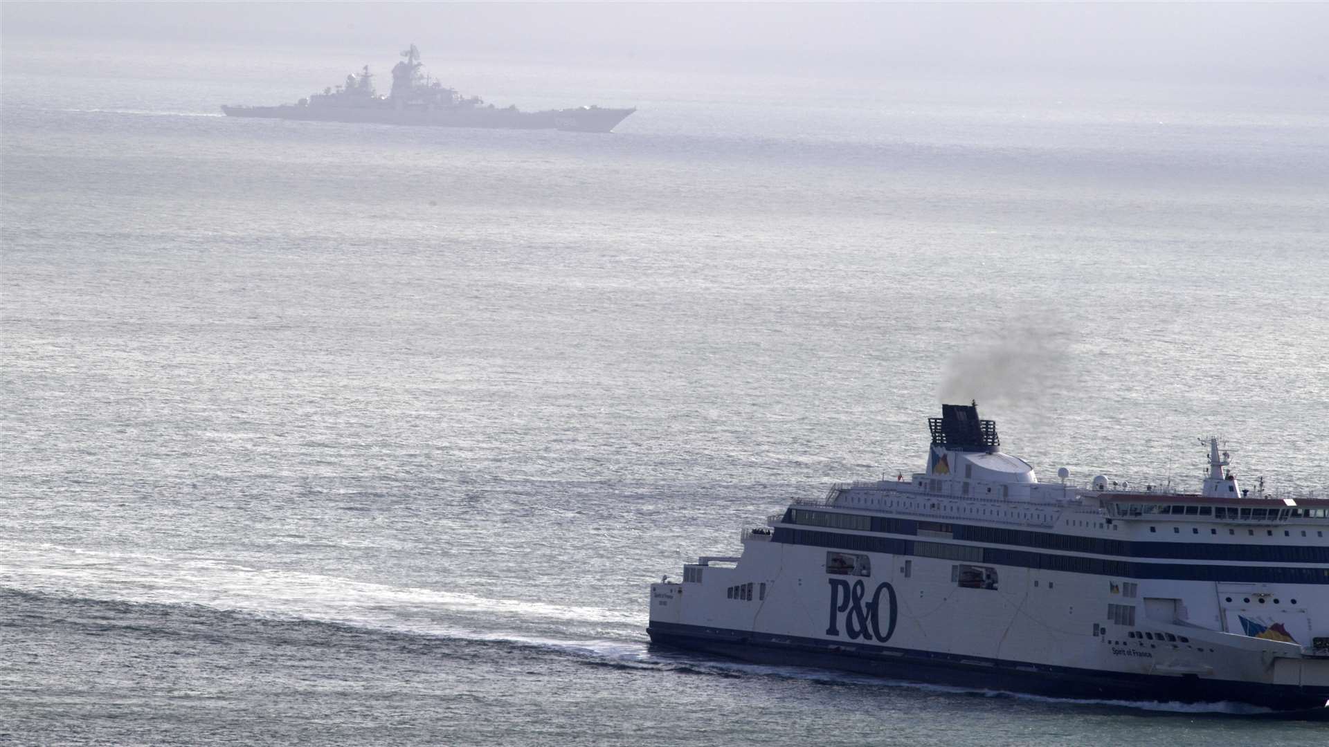 The aircraft carrier passes a P&O ferry in the Channel. Picture: Barry Goodwin.