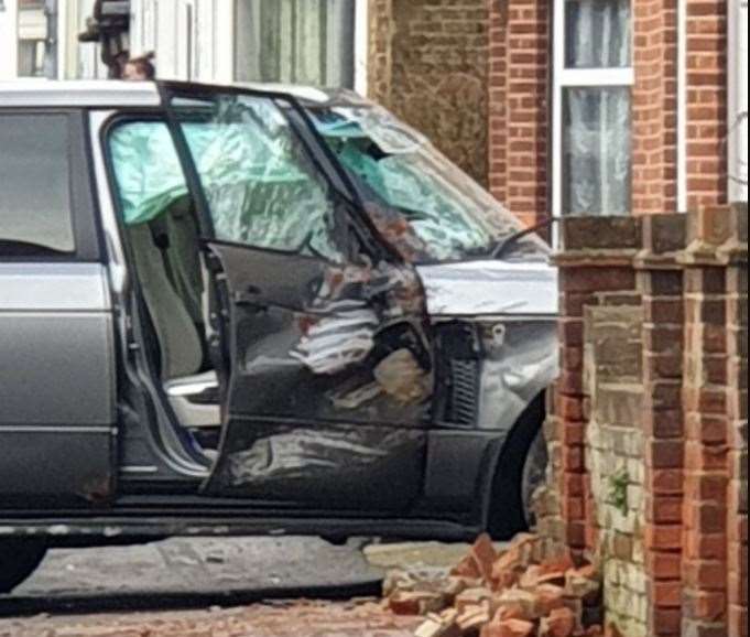 The badly damaged Range Rover