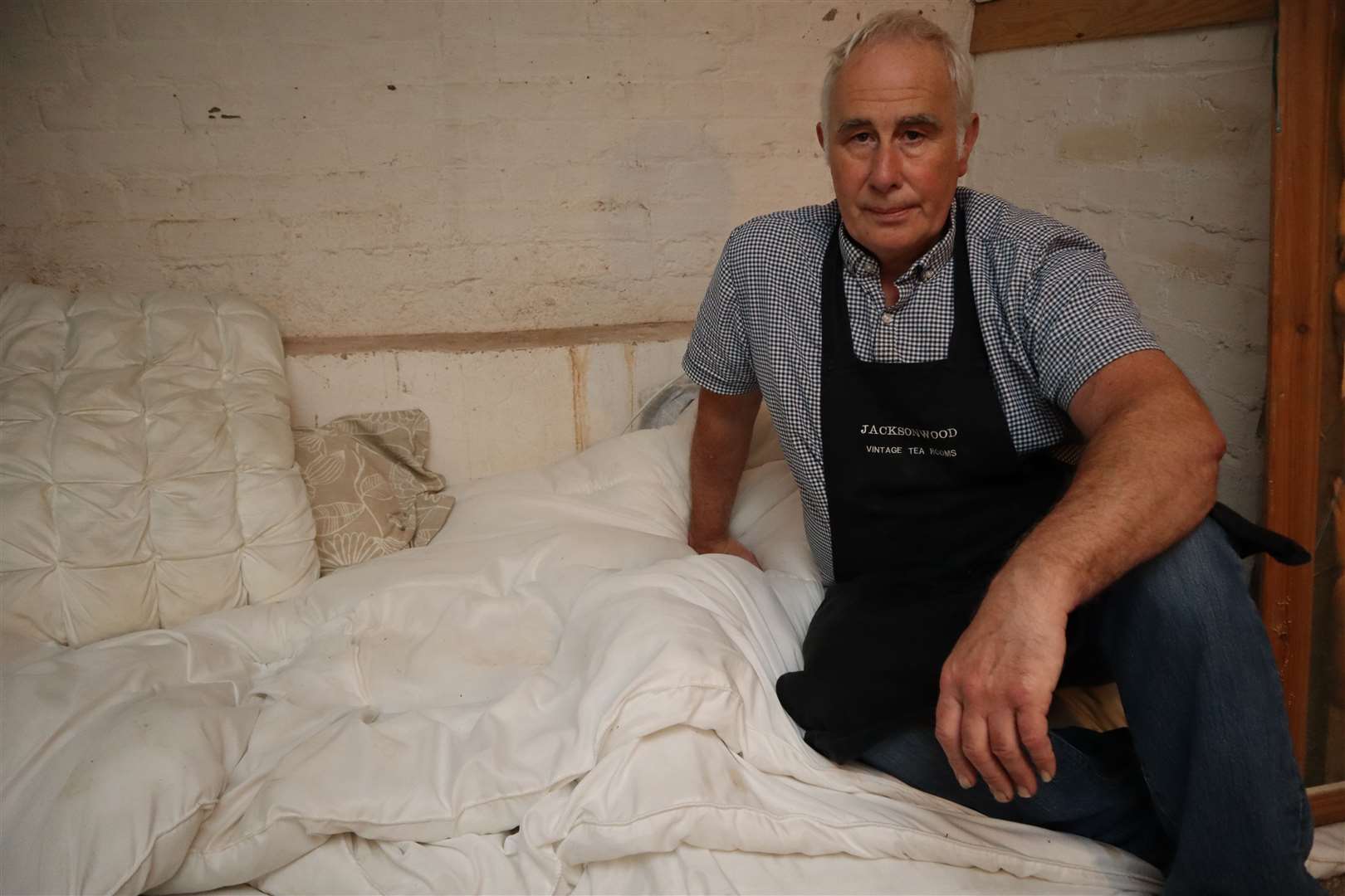 Sheppey businessman Steve Jackson shows where he slept in the basement of his Jacksonwood tea rooms in Sheerness High Street. Picture: John Nurden