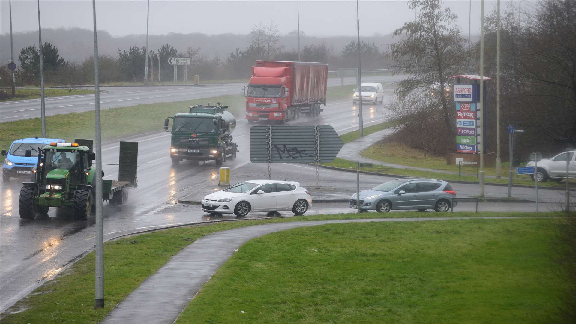 Vehicles turning out of Barrey Road onto the A2070 dual carriageway