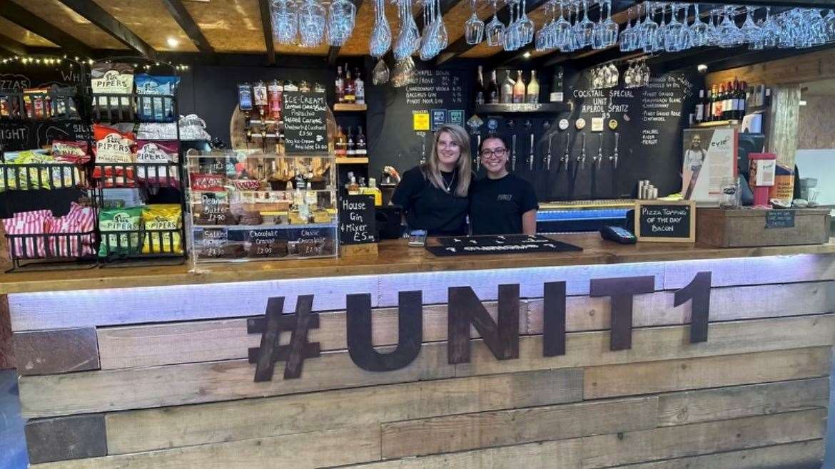 Staff behind the bar at the Unit 1 pub in West Hythe. Picture: Kenza Bowman