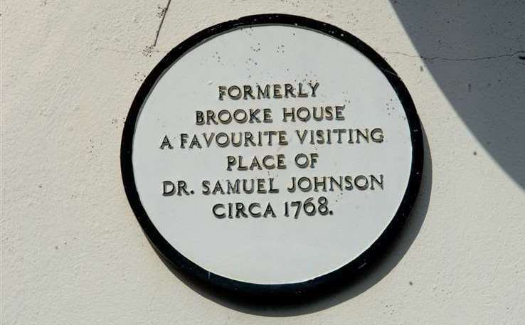 A plaque mark the building's history