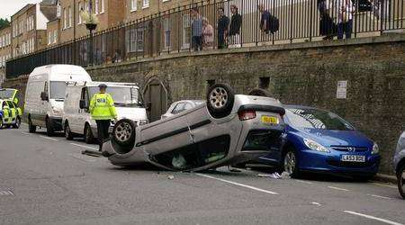 The overturned car in Rochester High Street
